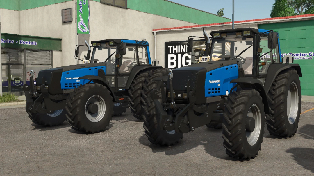 Valtra 8750 Series tractors in FS25 mod showcased in front of a sales building.