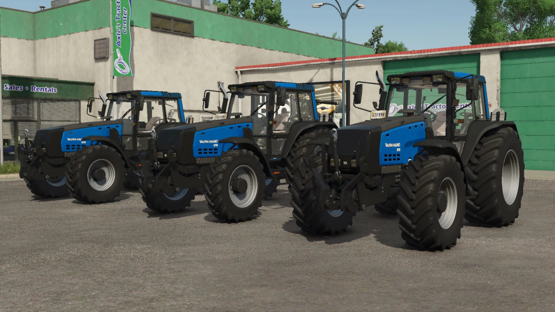 Three Valtra 8750 Series tractors in a row in FS25 mod, showcasing their design outside a tractor rental and sales center.