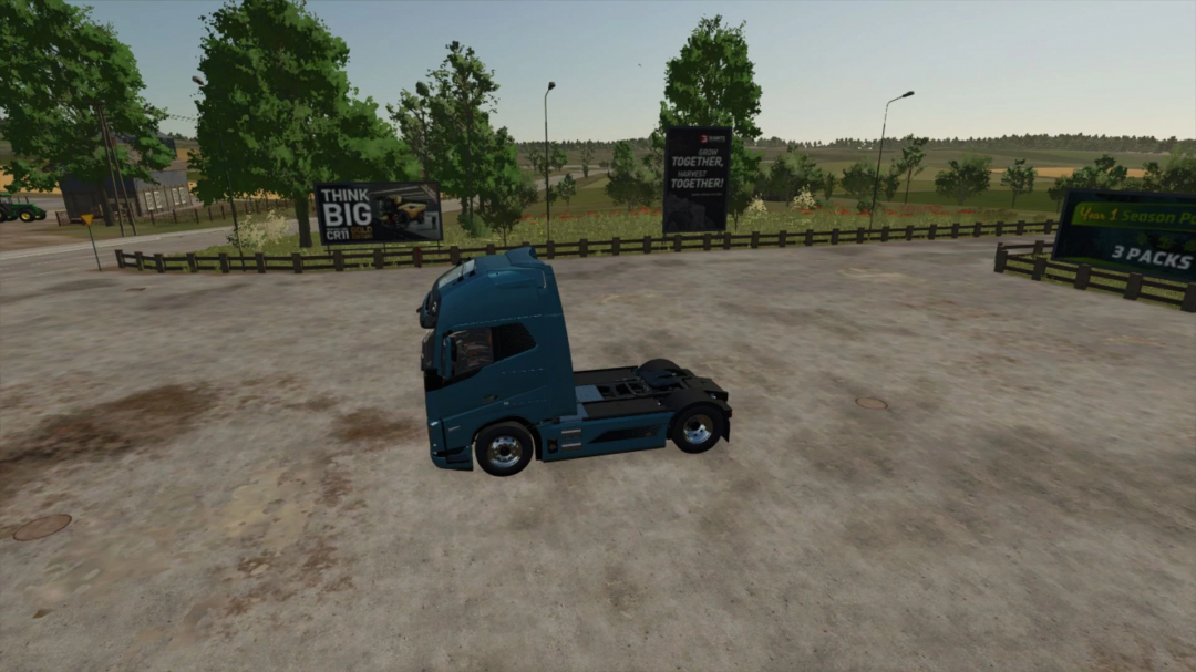 Volvo FH Electric 1000 mod in FS25, parked on a lot with billboards and trees in the background.