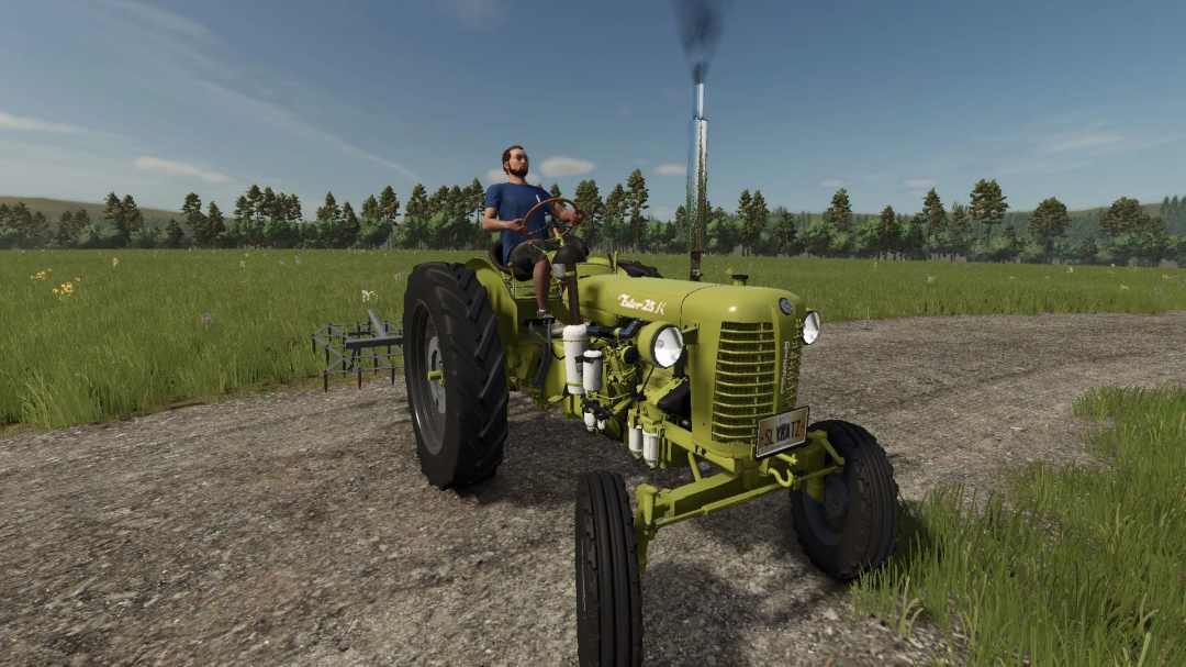 Zetor 25K V1.0.0.1 mod in FS25, featuring a classic green tractor on a dirt path with a realistic landscape.