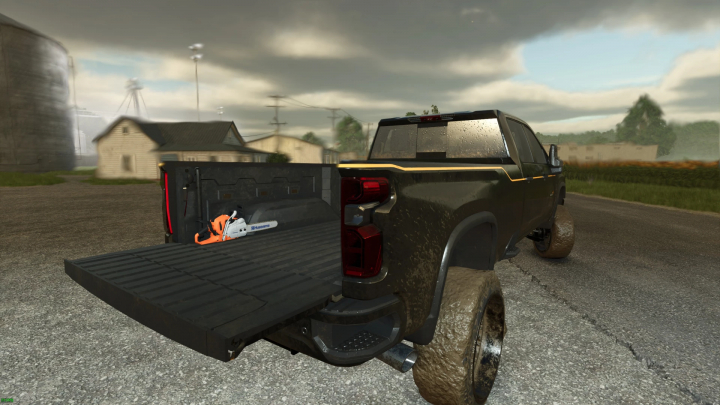 fs25-mods,  Carhartt Silverado V1.0.0.0 mod in FS25, featuring a muddy truck with a chainsaw in the open trunk.