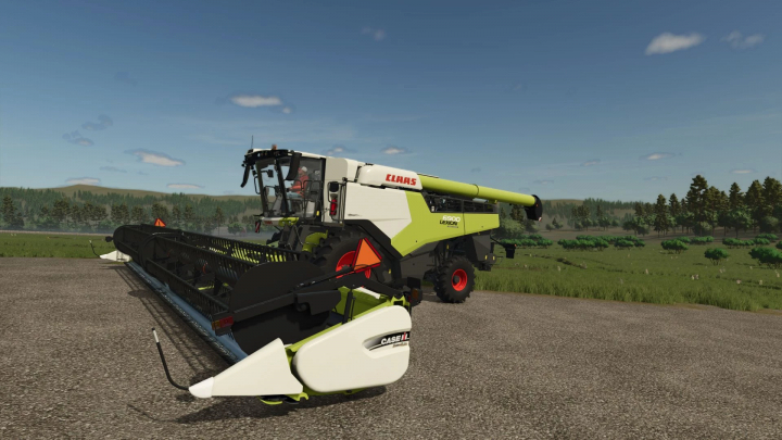 fs25-mods,  FS25 mods: Case IH Draper 3162 v1.0.0.0 in Farming Simulator 25, showcasing a large harvester on a farm road.