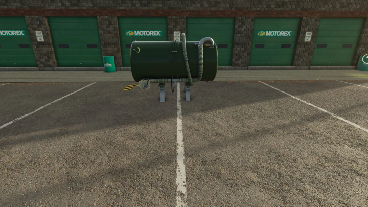 fs25-mods,  Goma Tank mod in Farming Simulator 25, showcased in front of a building with green shutters.