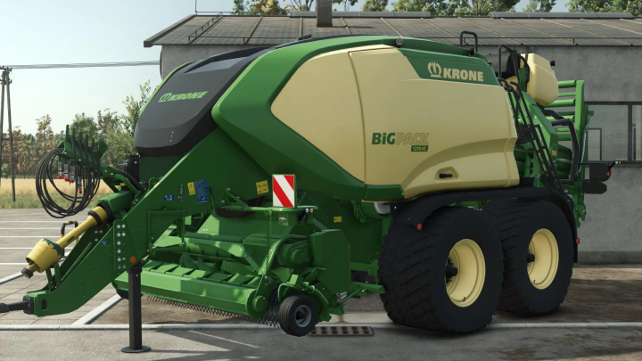 fs25-mods, Krone BiG Pack 1270 mod for FS25, featuring a green and yellow baler parked on a farm.