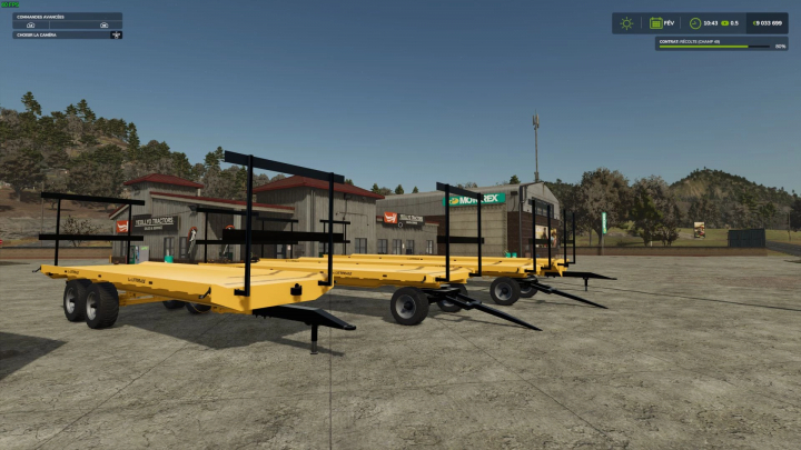 fs25-mods, La Littorale tray pack mod for FS25, featuring yellow trailers in front of tractor shop.