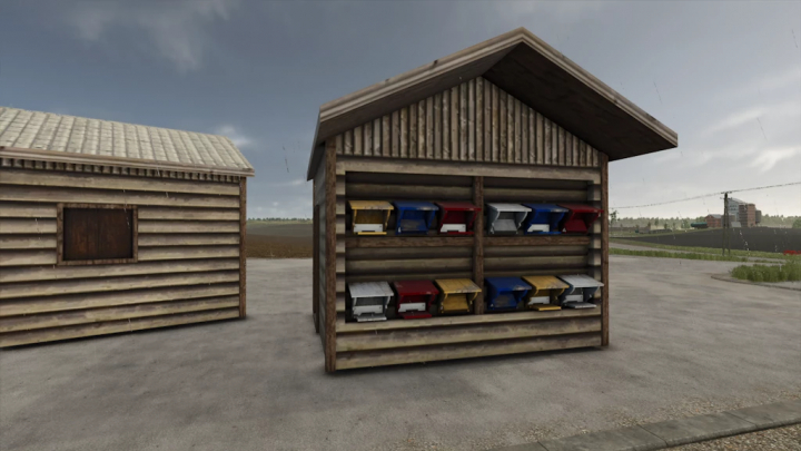 fs25-mods,  Small Bee Hive mod in FS25, featuring colorful beehives on a wooden structure in Farming Simulator 25.