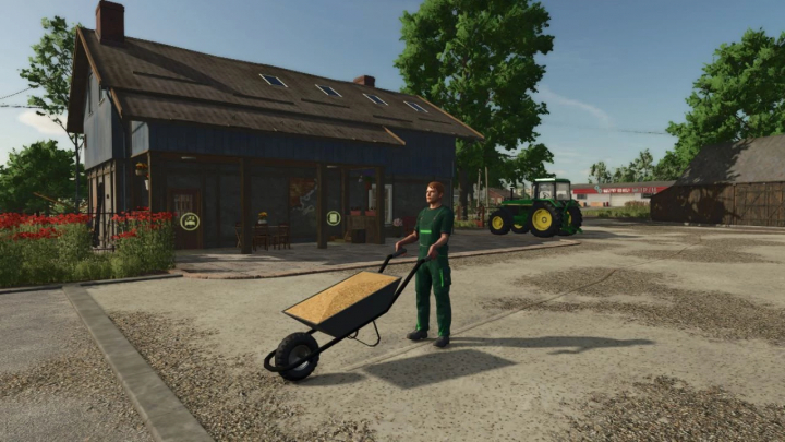 fs25-mods,  FS25 mods: A player using the Talicska Wheel Barrow mod in Farming Simulator 25, set in a farmyard with a building and tractor in the background.