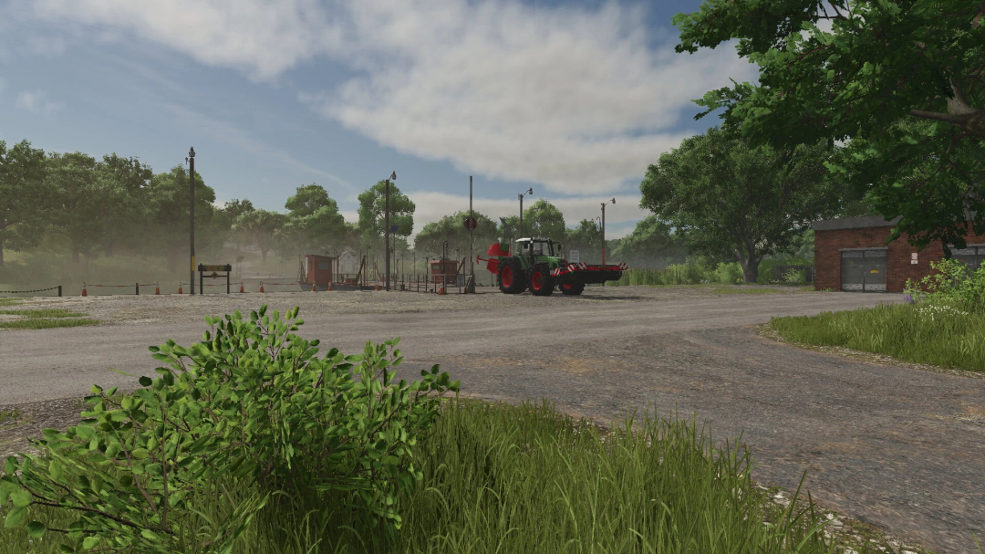 Tractor with Agromasz Packer in FS25 mod pack, parked near construction site. Farming Simulator 25 mods enhance gameplay.