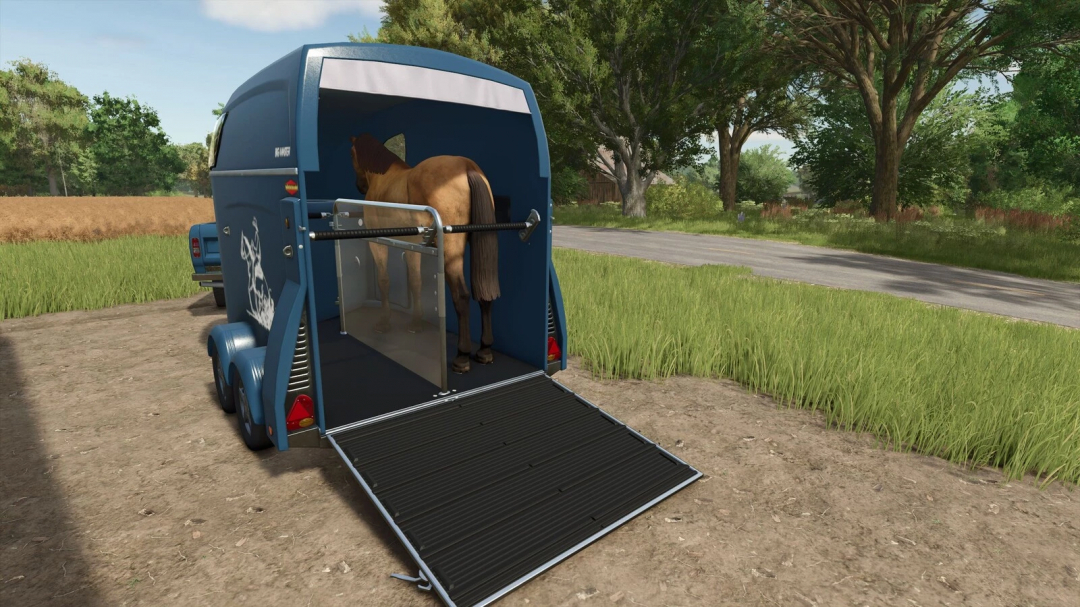 FS25 mod Boeckmann Trailer Pack v1.0.0.0 showing a horse inside a blue trailer in a rural scene.