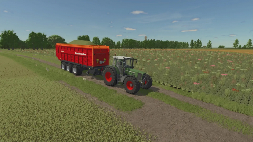 Tractor with CSS Schuitemaker Rapide 8400W trailer in FS25 mod on a field.