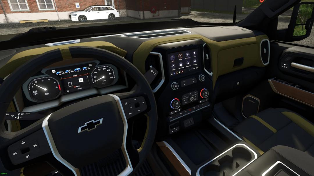 Interior view of the Carhartt Silverado V1.0.0.0 mod in FS25, showcasing dashboard and controls.