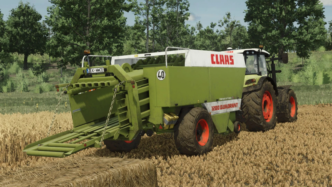 Claas Quadrant 1200 mod in FS25, showcasing a baler in a wheat field.