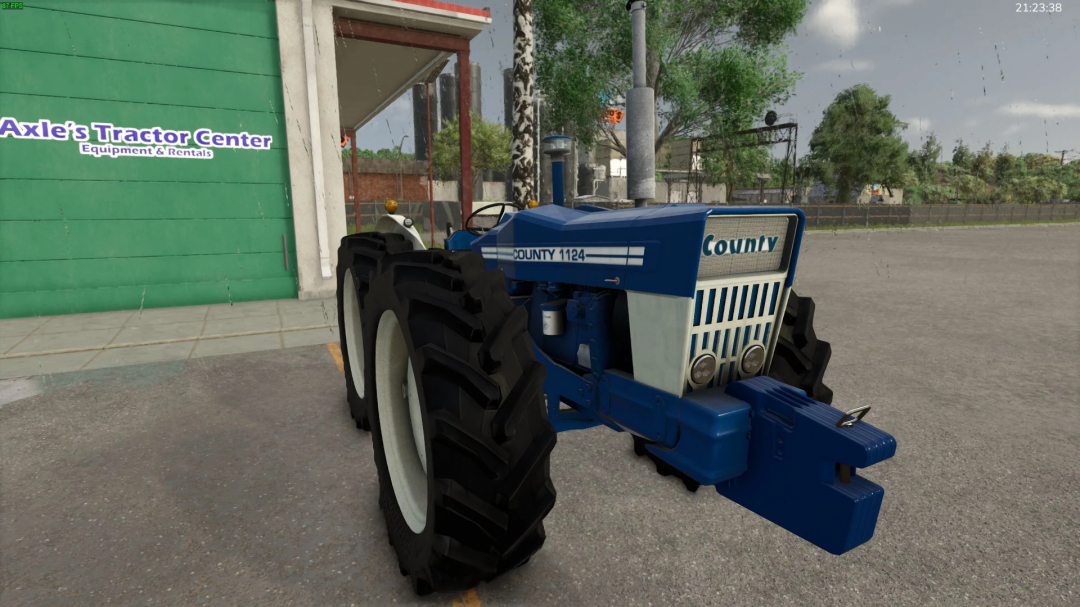 FS25 mod County 1124 tractor parked outside Axle's Tractor Center in Farming Simulator 25.