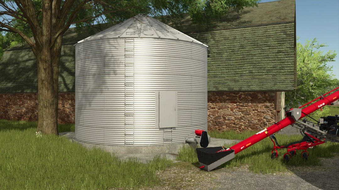 FS25 mod showing a 24' grain bin next to farm equipment and trees, part of the Farming Simulator 25 mods.