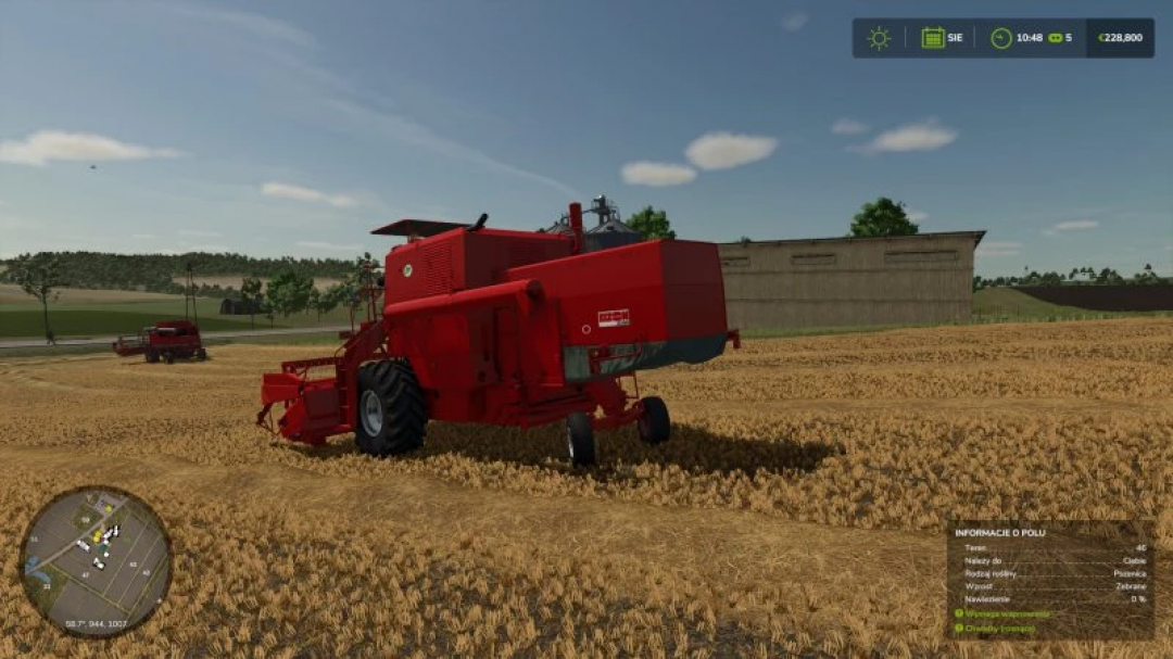 FS25 Bizon z056 v1.0.0.0 mod: Red combine harvester in a field, part of Farming Simulator 25 mods.