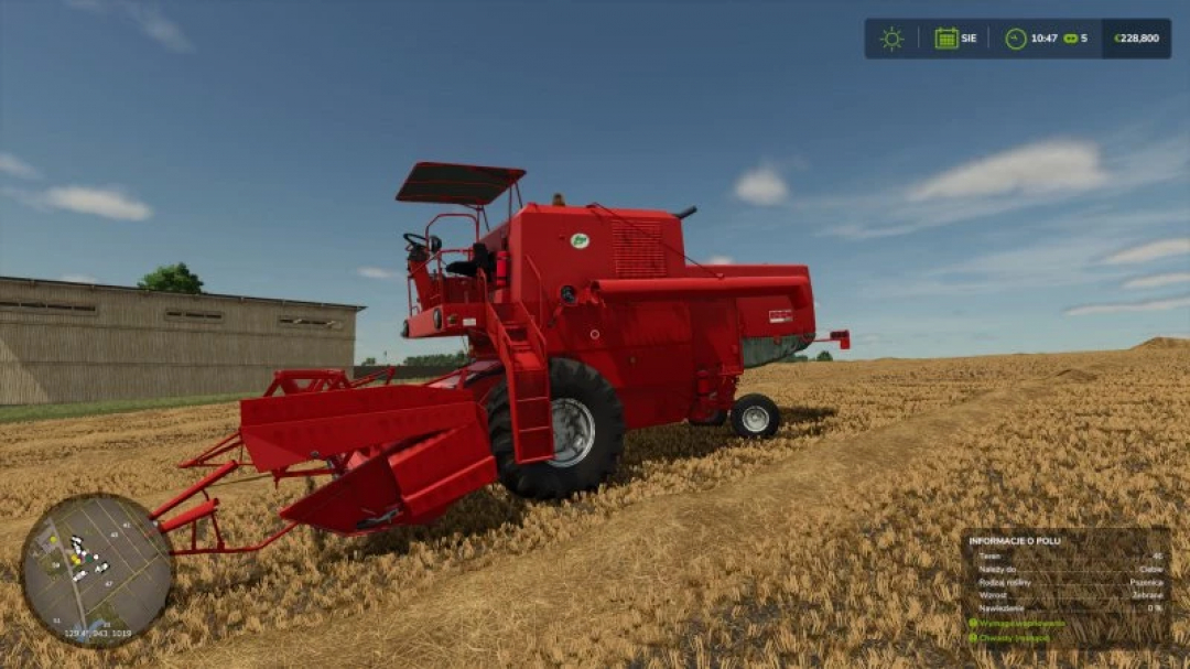 FS25 Bizon z056 mod in Farming Simulator 25, showing a red harvester in a field.