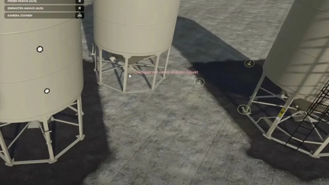 Large silos in Farming Simulator 25, part of Fed Mod Pack v1.2.0.1, overlapping message visible.