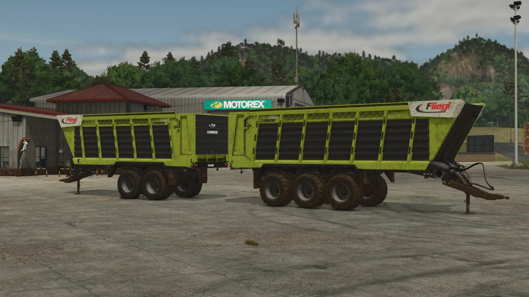 Fliegl CARGOS 750/760 trailer mod in FS25, parked in a farmyard setting.