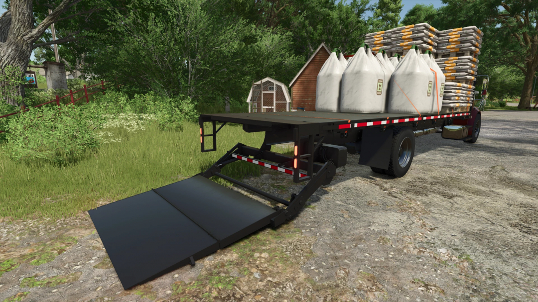 Freightliner M2 Stakebed AutoLoad mod for FS25 with loaded pallets and cargo bags.