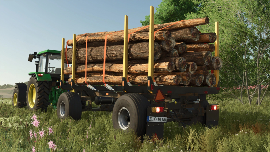 FS25 mod HW80 Wood Trailer loaded with logs, attached to a green tractor in a field.