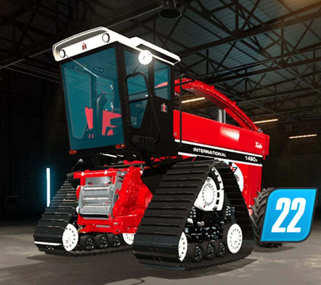 International 1490x tractor mod in FS22, showcasing its robust red design in a warehouse setting.