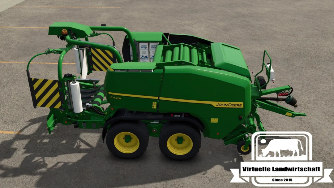 JD C441R mod for FS25 showcasing a green John Deere baler on asphalt.