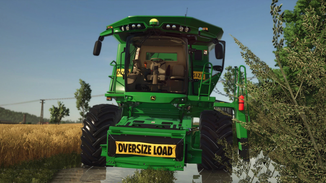 John Deere S700 Series in FS25 mod version 1.0.0.0, displaying 'Oversize Load' sign. Farming Simulator 25 mods.