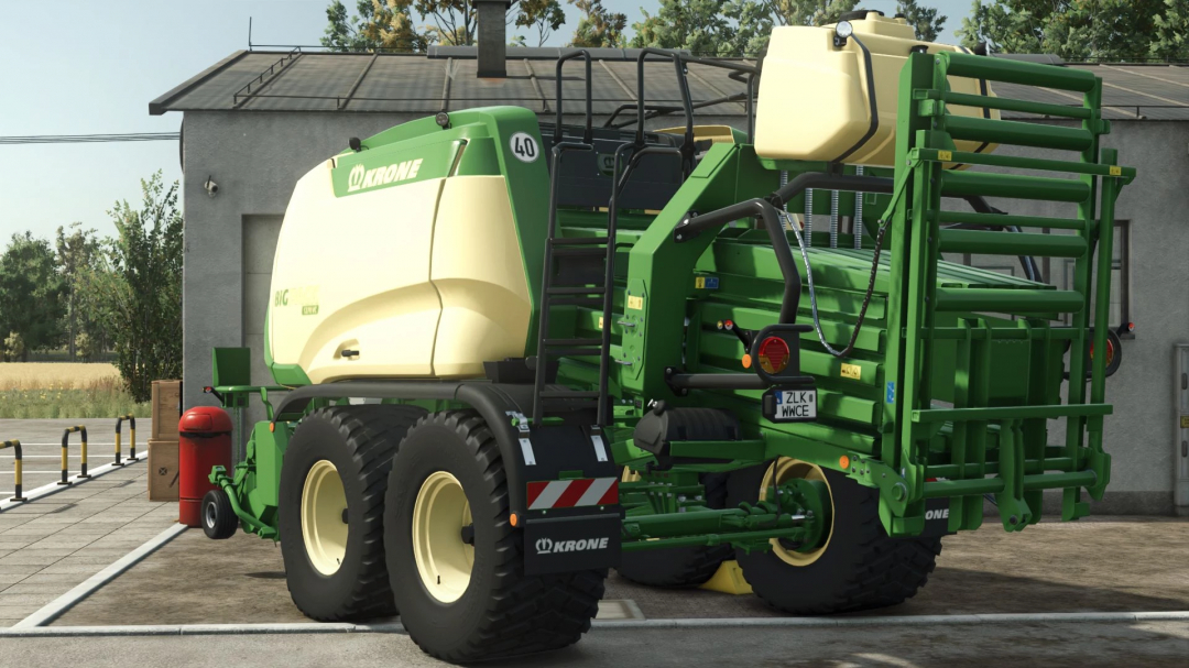 Krone BiG Pack 1270 mod in FS25, showcasing a green and yellow baler next to a building.