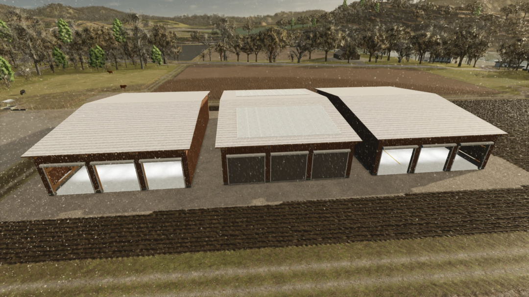 Three large drive-through halls in a rural setting, part of LSFM Drive Through Hall Pack mod for Farming Simulator 25.