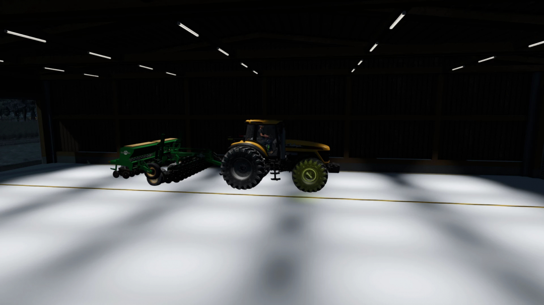 FS25 LSFM Drive Through Hall Pack v1.0.0.0 showing a tractor with equipment inside a large, well-lit hall.