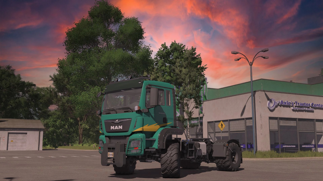 FS25 mod Man TGS AGRI v1.0.0.2 with green tractor at sunset near Axle's Tractor Center.