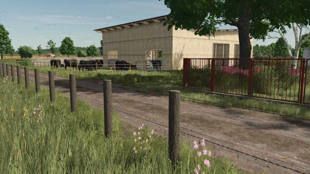 FS25 Meadow Fence mod showing a rustic fence and cows beside a barn.