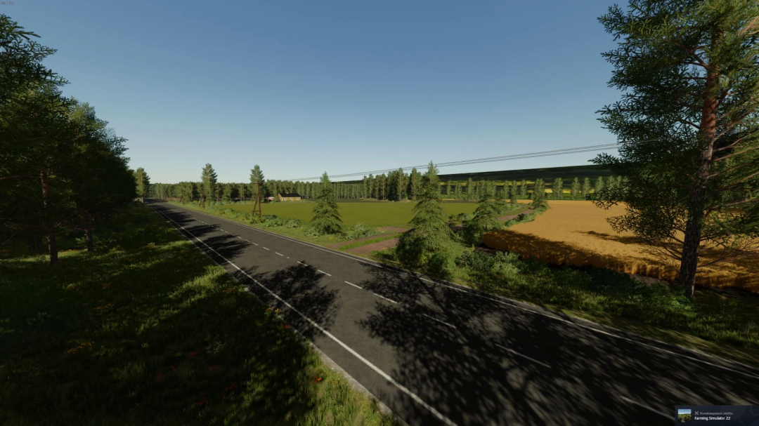 FS22 Mäntykoski Map v1.1.0.0 showing a scenic road with trees and fields in Farming Simulator 22 mods.