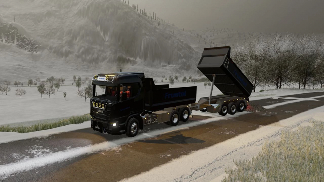 FS22 Scania R Series Pack mod with snow-covered landscape, featuring a black truck with a tipping trailer.