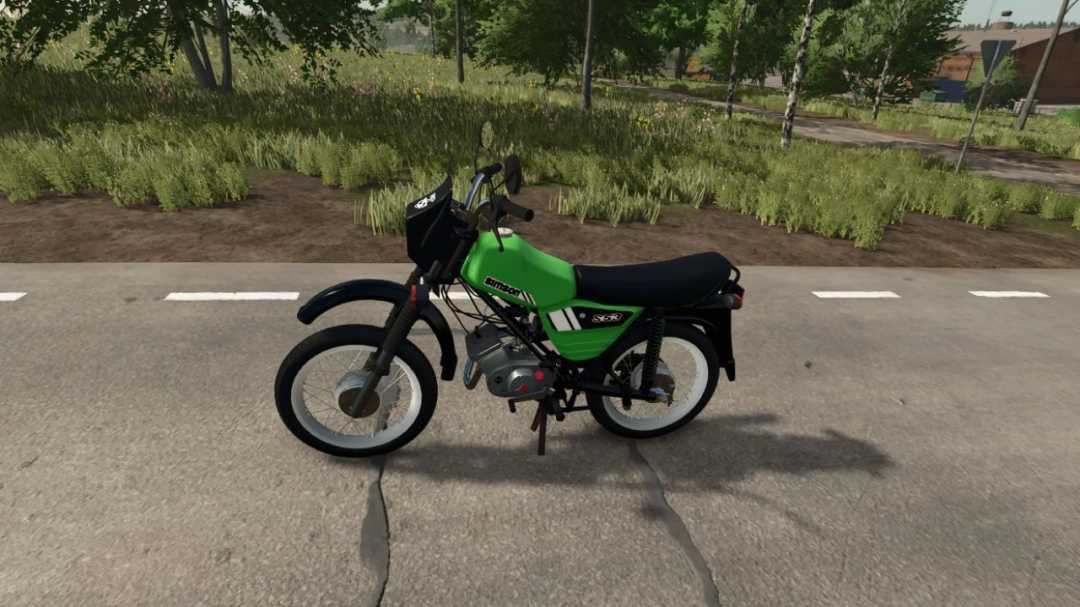 Simson S53 mod in FS25 on a road, featuring a green and black design.