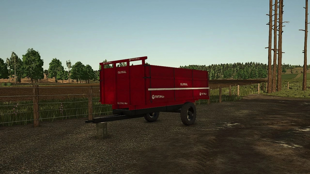 Red Triton 4T trailer mod for FS25, on a farm road next to a wooden fence and trees.