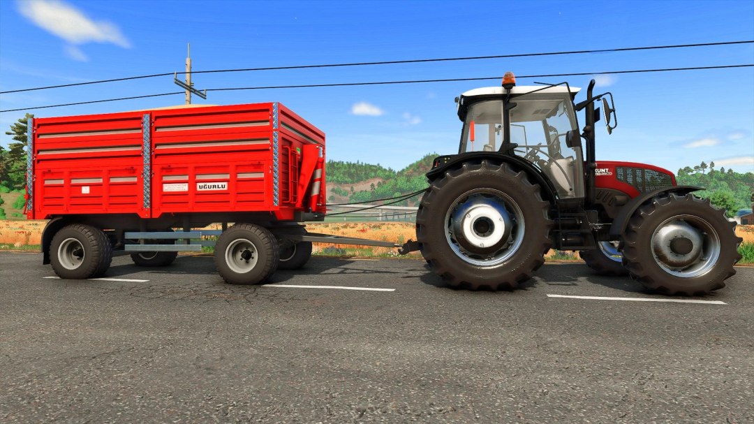 FS25 mod: Ugurlu Agricultural Trailer 5T v1.0.0.0 attached to a tractor on a road.