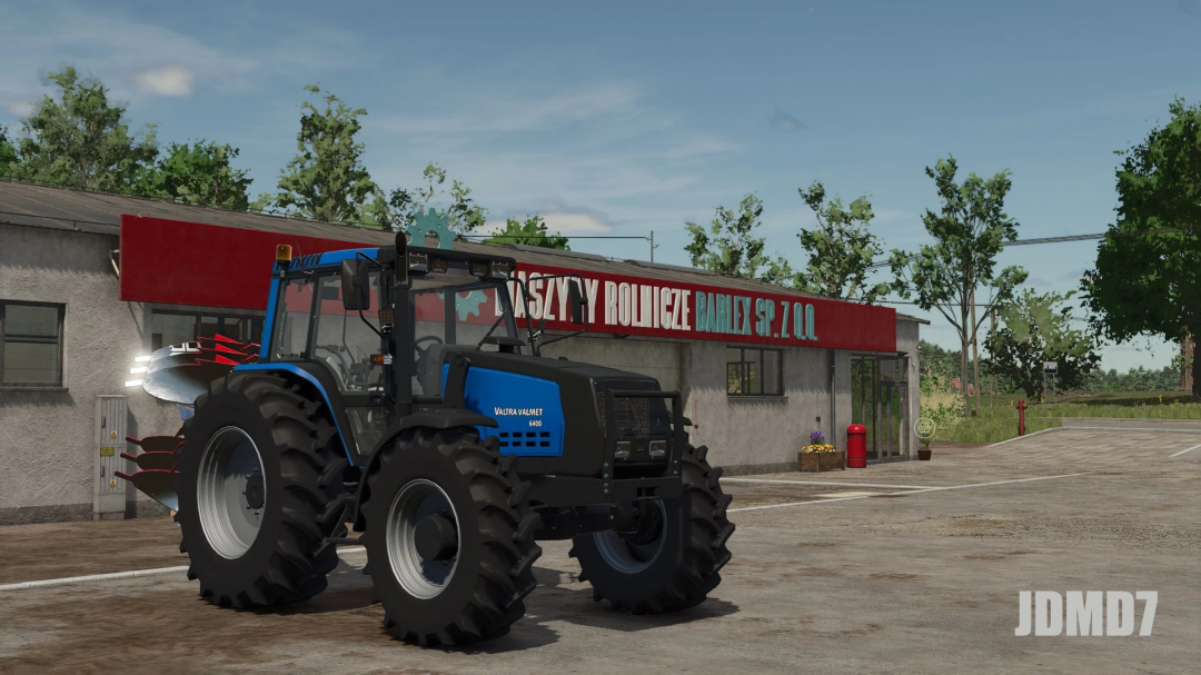 Valmet 6400 tractor mod in FS25 in a rural setting, showing its features and design.