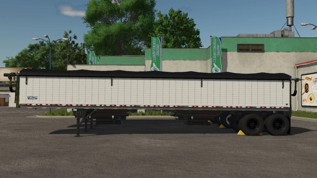 FS25 mod Wilson Pacesetter v1.1.0.0, featuring a detailed white trailer in a farming environment.