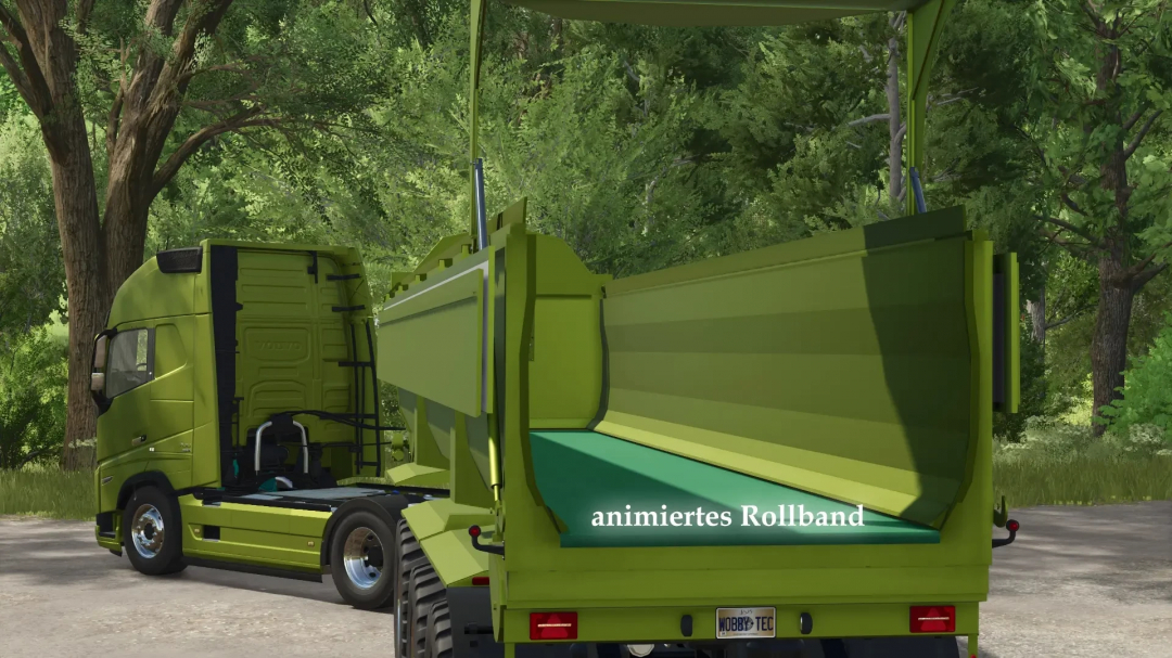 FS25 mod WobbyTec Krampe Pack v1.0.0.0 showing green truck with open tipper and animated rolling belt.