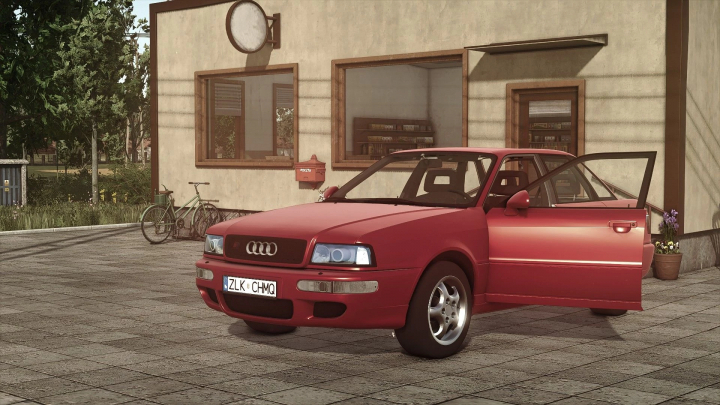 fs25-mods,  Audi 80 car mod in FS25 parked in front of a building with open door.