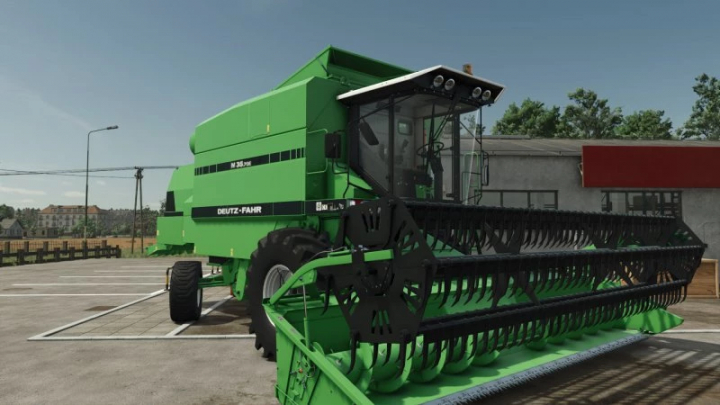 fs25-mods,  Deutz-Fahr M series harvester in FS25 mod pack, parked near a building.