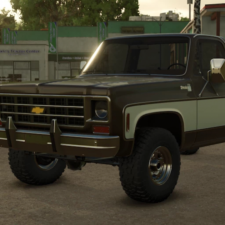 fs25-mods,  FS25 1978 Chevy K10 mod for Farming Simulator 25, showcasing a vintage brown and cream truck in a rural setting.