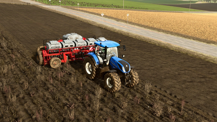 fs25-mods,  FS25 mod Lizard SSM FFI v1.0.0.0 showing a blue tractor with red machinery on a field.