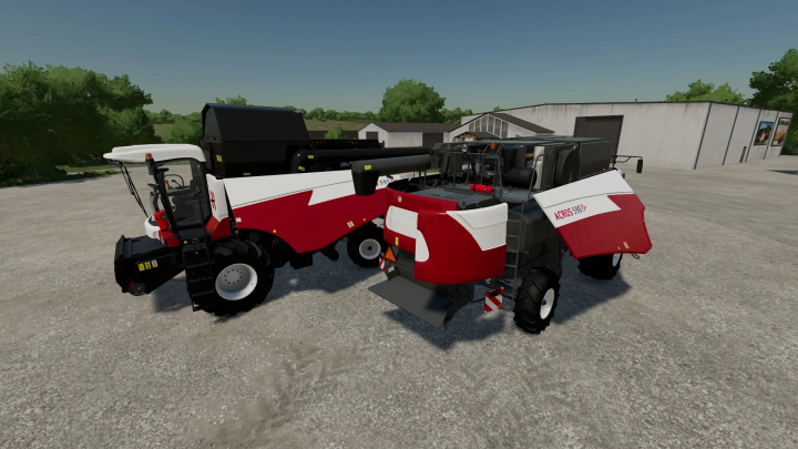 fs22-mods,  RSM-152 Acros-590 combines in FS22 mod, Farming Simulator 22. Two red and white harvesters parked on concrete.