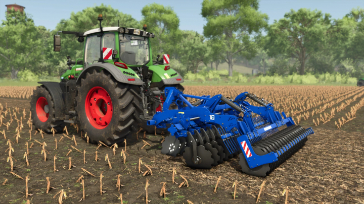 fs25-mods,  FS25 mod Rolmako U671 in a field behind a green tractor, showcasing detailed farming equipment.