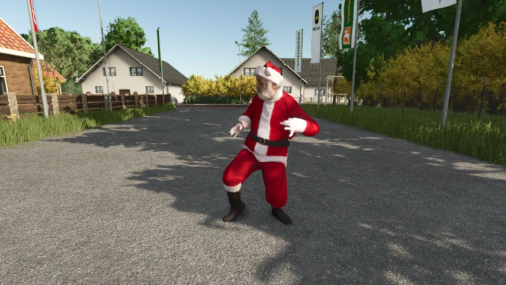 fs25-mods,  Santa Claus Animated Decoration in FS25 mod, standing on a village road with houses and trees in the background.