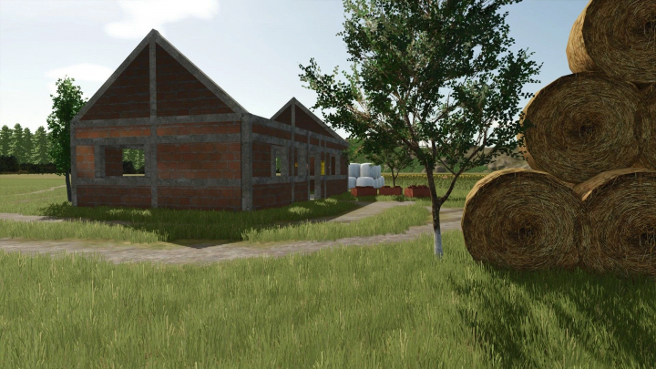 fs25-mods,  FS25 mod Warminska Dolina v1.0.0.0 features a rural scene with a brick building, hay bales, and greenery.