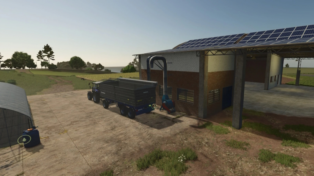 FS25 mod Addable Triggers v1.0.0.0 showing a trailer near a building with solar panels.