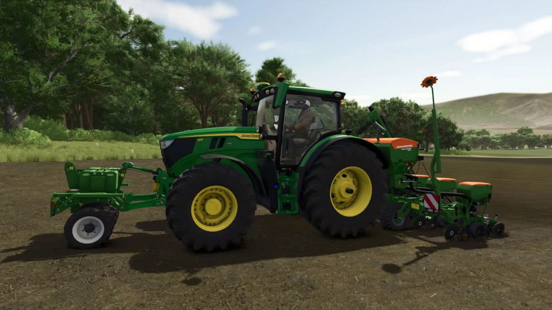 FS25 mods: Amazone T-Pack U tractor working in a field. Farming Simulator 25 mod.